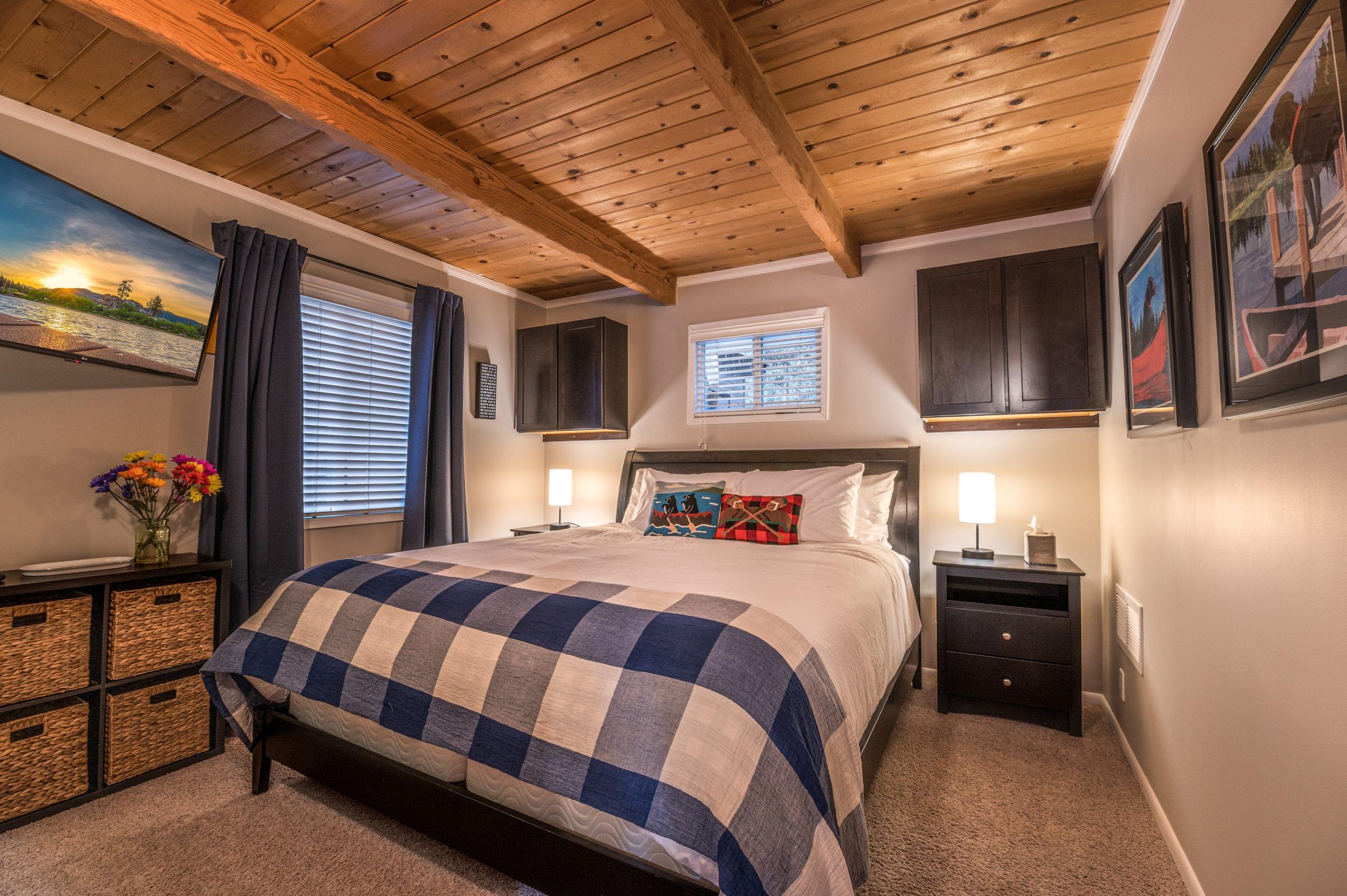 Downstairs King bedroom with blackout drapes. 42" loaded Roku TV.